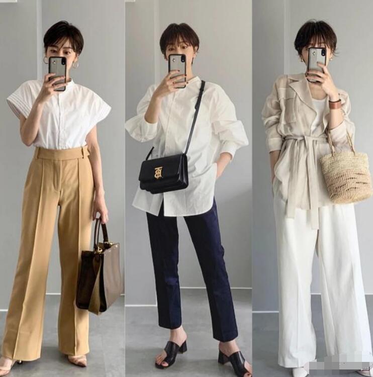 白色泡泡袖衬衫搭配深蓝色的西装裤