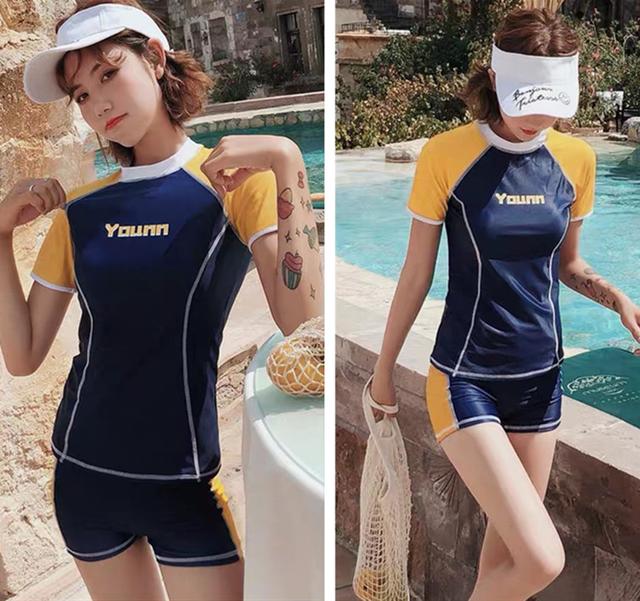 黄蓝拼接运动风泳衣