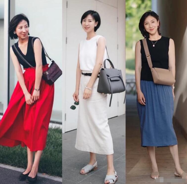 黑色背心 蓝色半身裙