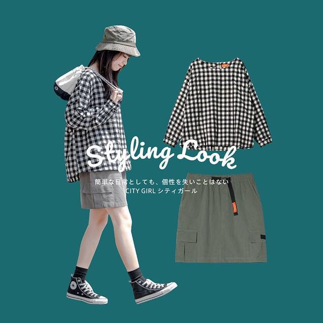 黑白格子长袖上衣 深灰色短裙