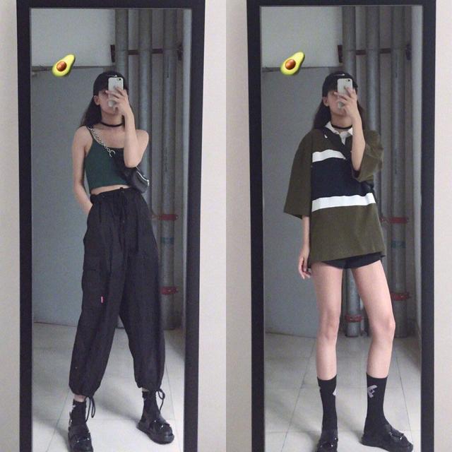 墨绿色的短吊带搭配黑色的工装裤