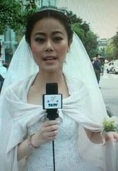 陈莹简介：雅安“最美新娘”主播穿婚纱报道地震灾情引热赞（图）